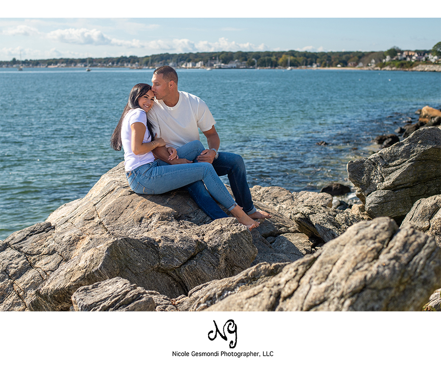 candid engagement photos by the ocean