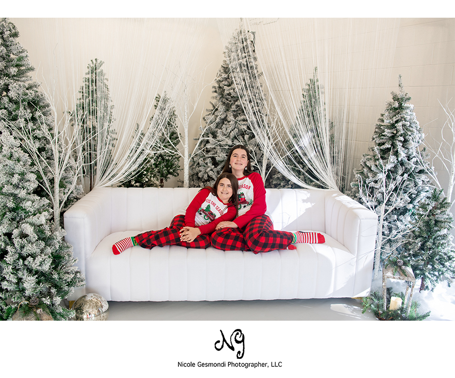 siblings wearing matching Christmas pajamas Warwick, RI