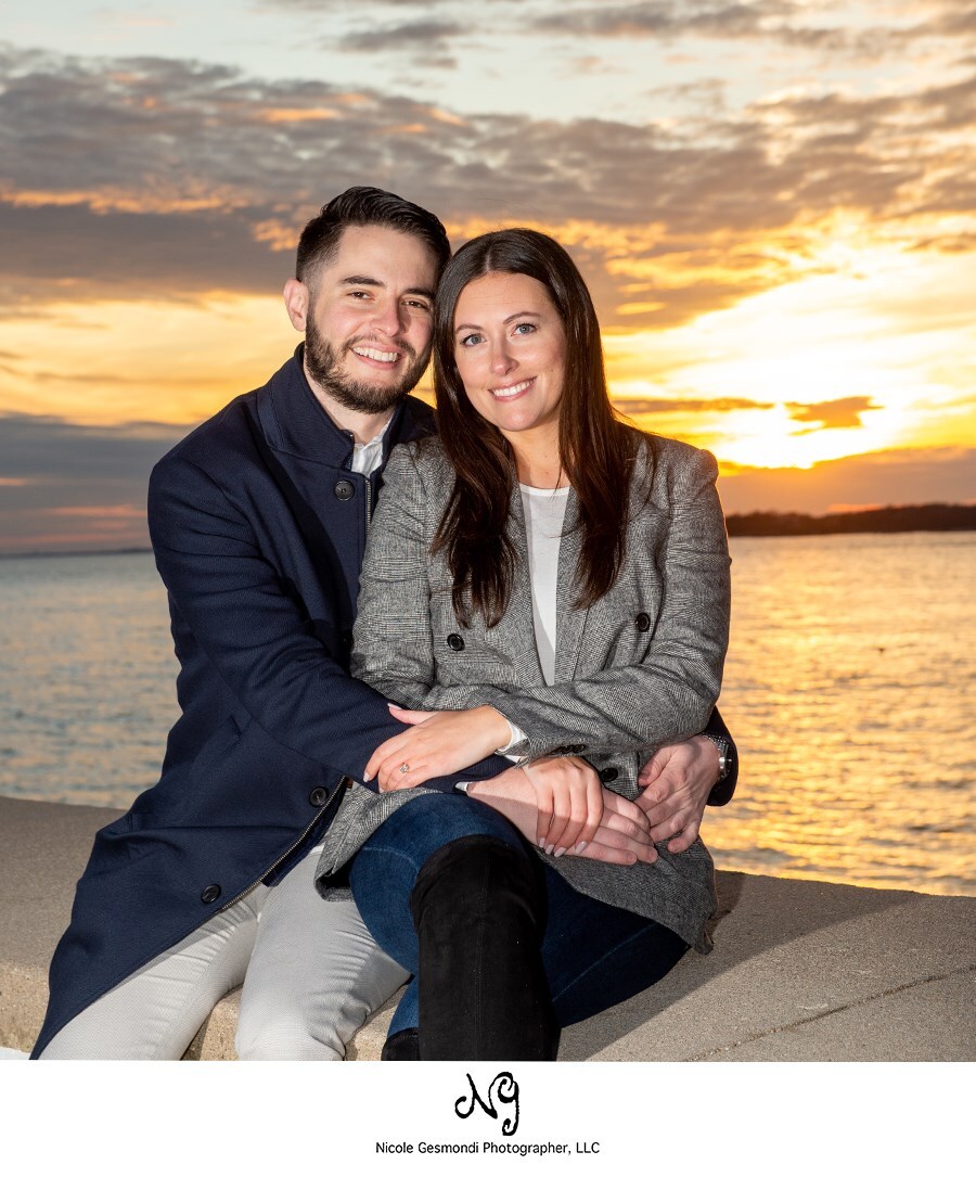 Photo of newly engaged couple with sunset in Newport, RI