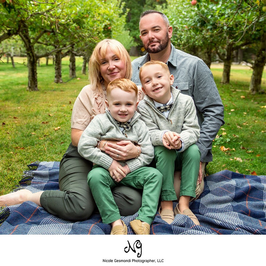 fall family portraits taken in an apple orchard in RI