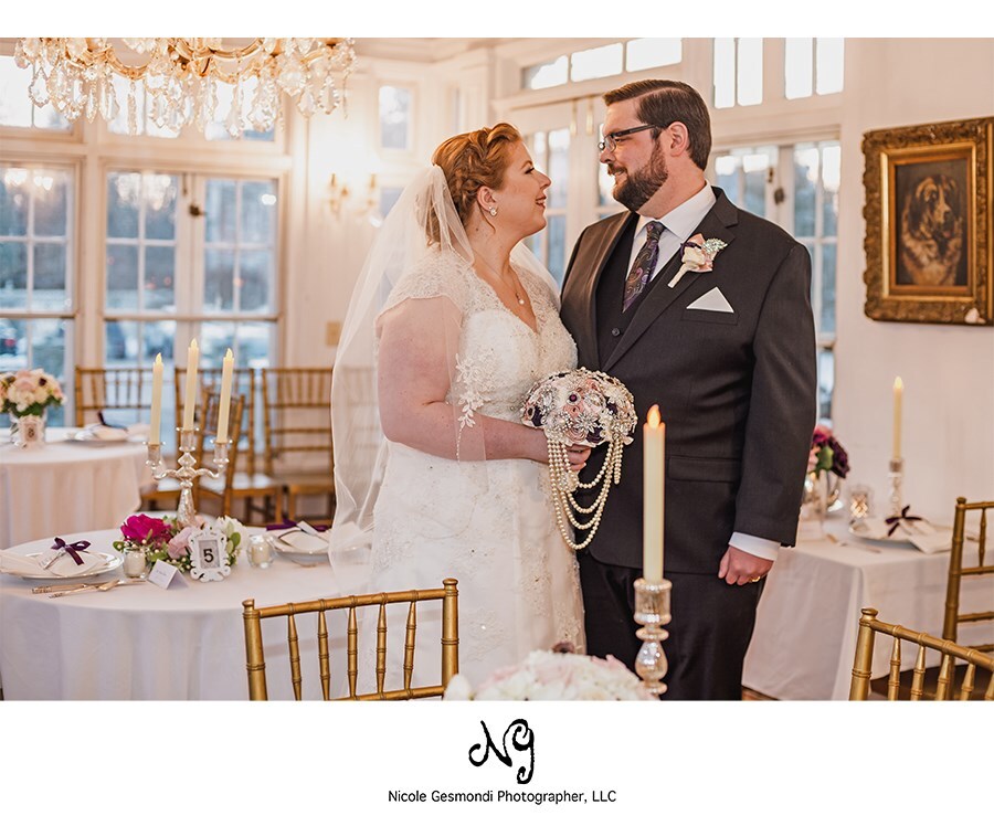 bride and groom looking at each other inside their wedding reception at Edgewood Manor in Cranston RI