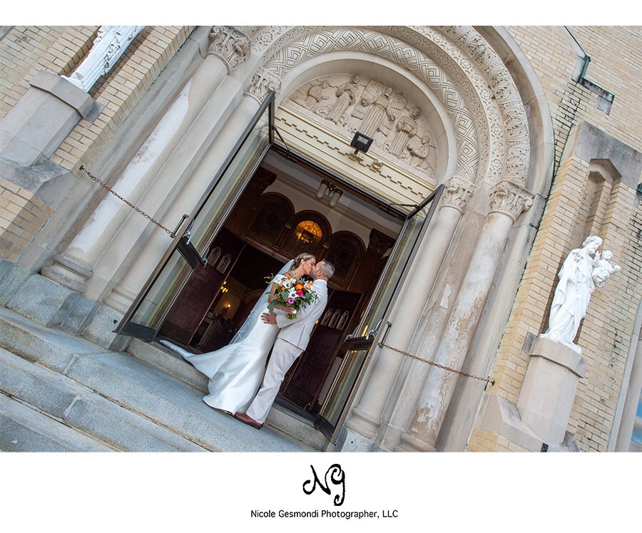 newlyweds outside st James church in RI